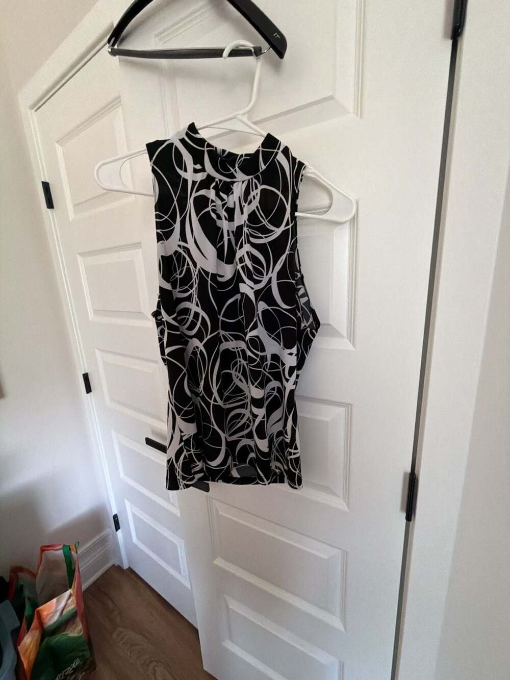 KC Stevens Women's Sleeveless Mock Neck Top with Black and White Abstract Swirl